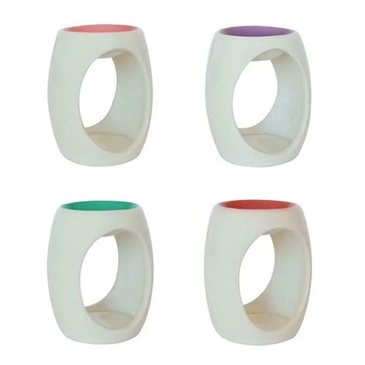 Ceramic oil burner for use with essential oil. Choice of red, green, purple or pink.