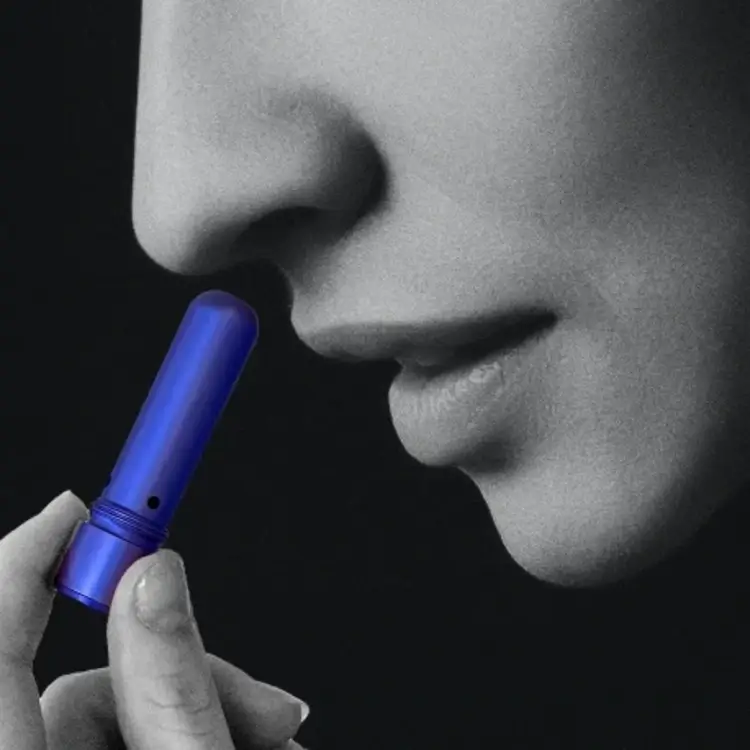 Blue personal diffuser being used