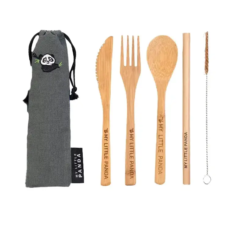 Compact bamboo cutlery set, emerald green colour. Knife, fork, spoon, straw and cleaning brush in a drawstring carry case. Biodegradable,compostable and plastic-free.