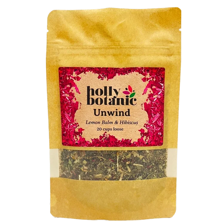 Unwind tisane by Holly Botanic, lemon balm and hibiscus. Herbal tea to relax and calm, 20 cup loose. Recyclable packaging.
