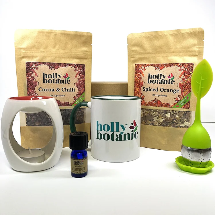 Fabulously festive gift set includes 20 cup spiced orange tisane, 20 cup coca and chilli tisane, festive essential oil blend, oil burner, mug and infuser. Presented in a magnetic-close, cardboard gift box.