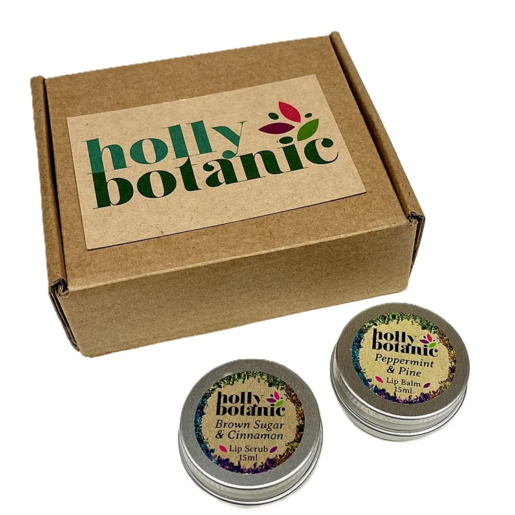 Lip Love Gift Set by Holly Botanic contains your choice of handmade lip balm and lip scrub presented in a branded, cardboard gift box.